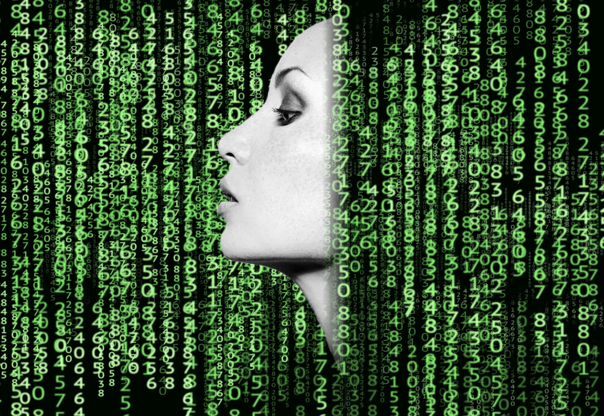 Profile of a woman with cascading green numerical data background