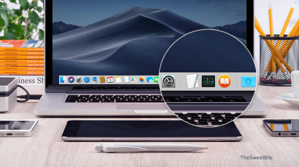 A MacBook showing a desktop with a focus on the dock and app icons.