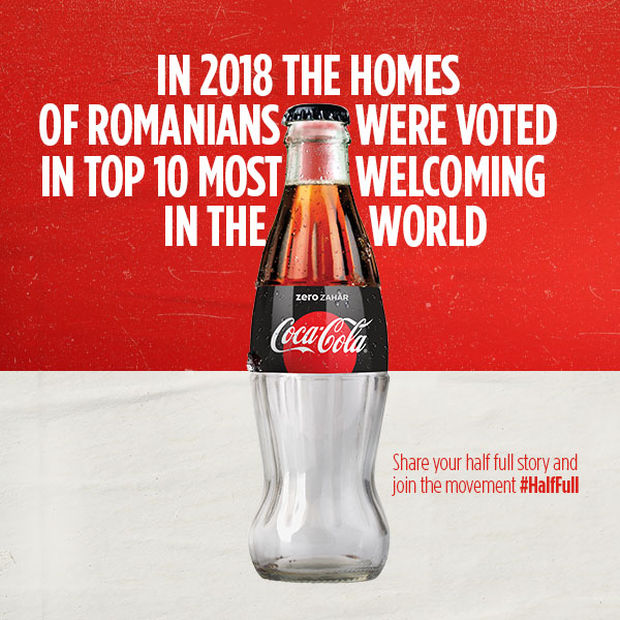 A Coca-Cola bottle on a bold red background promoting Romania's welcoming homes.