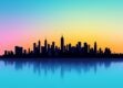 A minimalist city skyline silhouetted against a vibrant gradient sky.