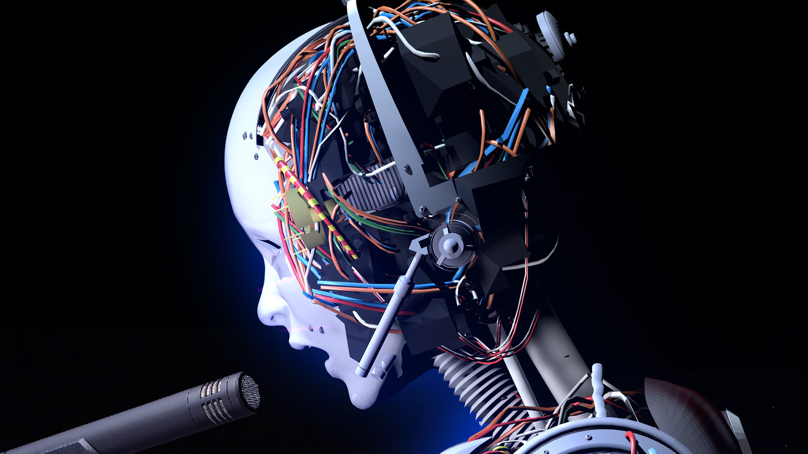 A humanoid robot head with visible circuitry beside a microphone.