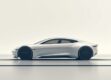 A sleek, modern car silhouette in muted tones, representing autonomous driving and reinforcement learning technology.