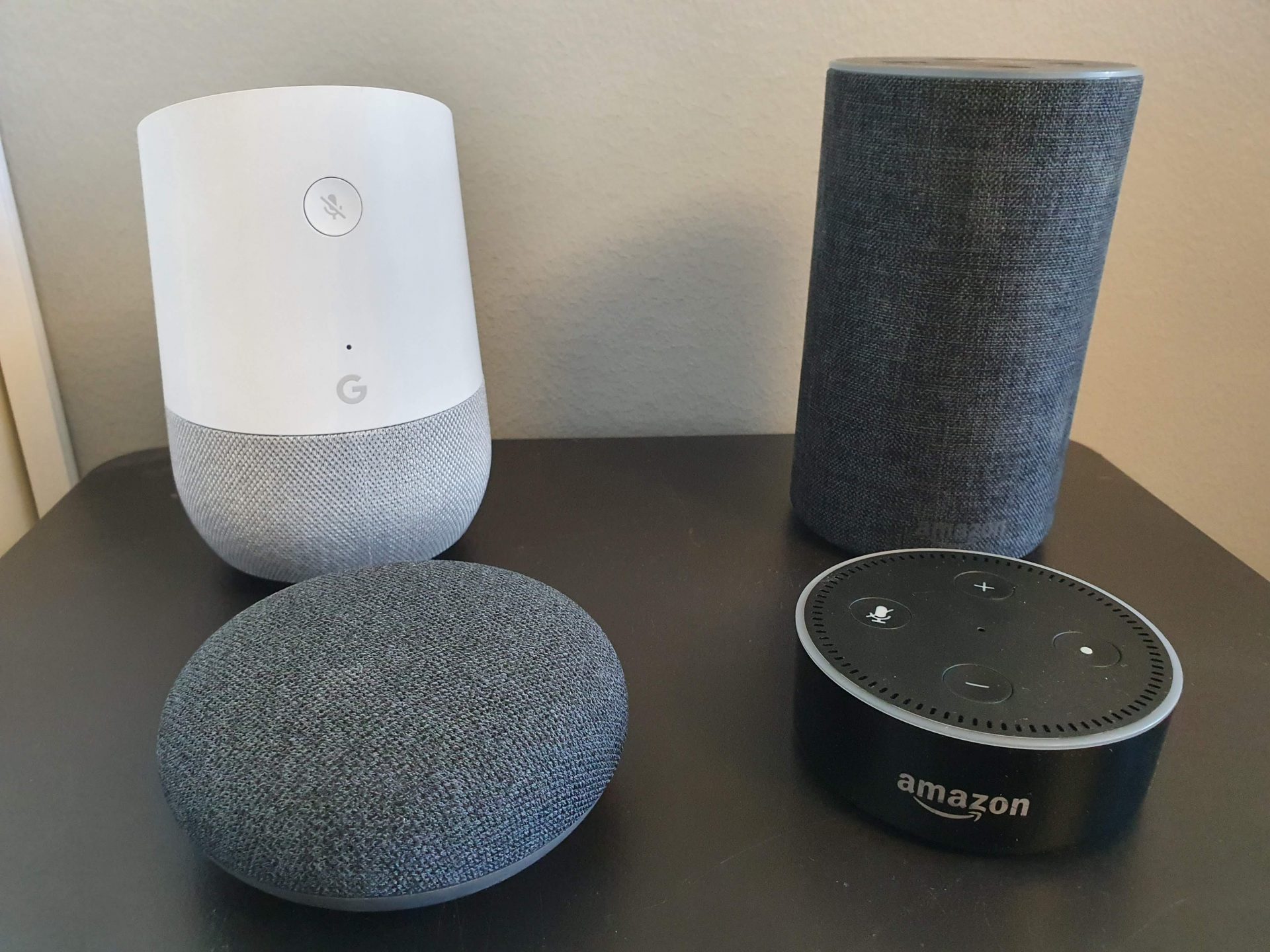 A collection of smart home assistants including Google and Amazon devices