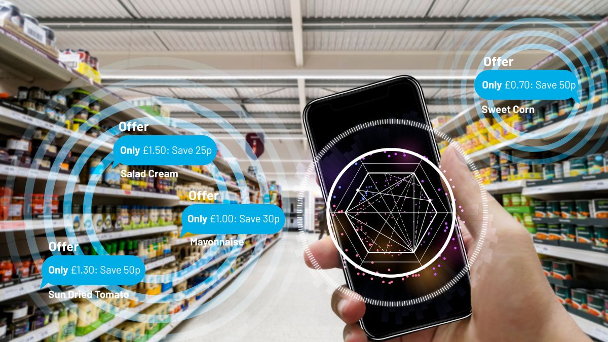 A person using a smartphone in a grocery aisle showing offers.