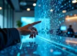 A sleek, futuristic workspace featuring a holographic interface displaying interconnected nodes in blue tones, a hand reaching towards it above a glass desk.