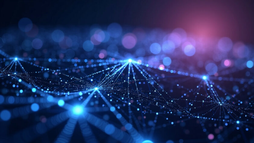 A sleek, futuristic 3D visualization of interconnected neural networks glowing in deep blue and purple hues against a dark background.