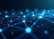 A sophisticated 3D visualization of interconnected geometric nodes glowing with blue and white light, representing a neural network.